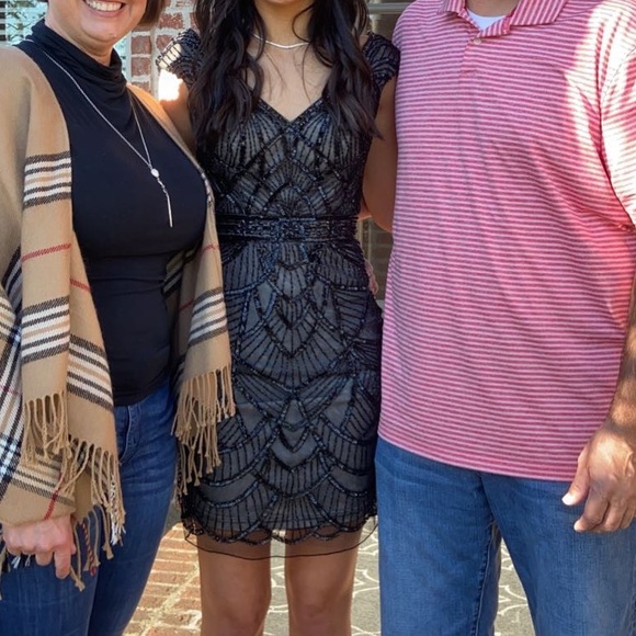 Short homecoming dress with black beading and nude under layer. - Picture 2 of 2